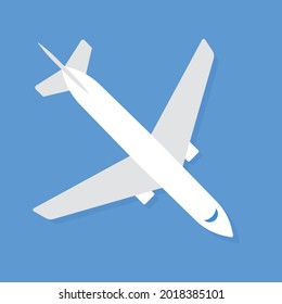 Avión blanco sobre fondo azul. Vista superior.