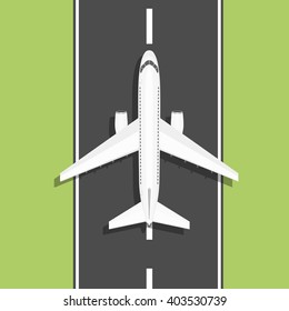 White airplane rides on the runway