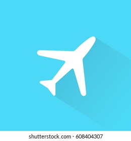White airplane with shadow on blue background