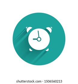 White Alarm clock icon isolated with long shadow. Wake up, get up concept. Time sign. Green circle button. Vector Illustration