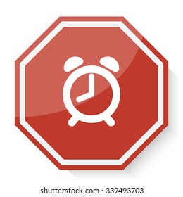 White Alarm Clock icon on red stop sign web app