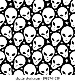 White alien heads isolated on black background. Cute monochrome seamless pattern. Vector simple flat graphic illustration. Texture.