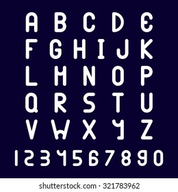 White alphabet set on dark background