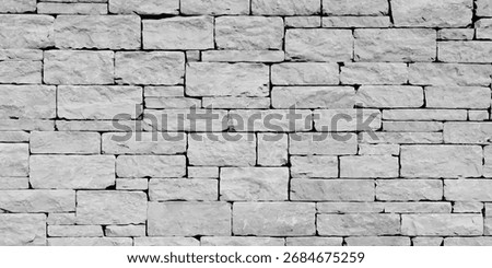 White ancient stone brick wall texture background.