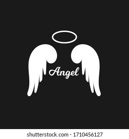 White Angel wings icon with nimbus isolated on dark background - stock vector