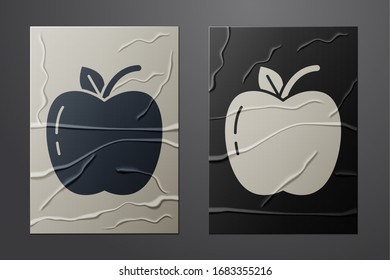 White Apple icon isolated on crumpled paper background. Fruit with leaf symbol. Paper art style. Vector Illustration