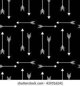 white arrows on black background seamless vector pattern illustration