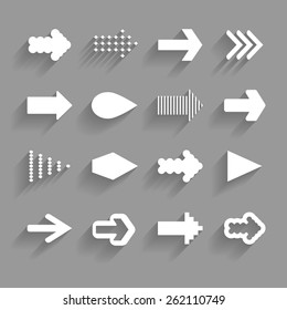  white arrows with shadows on the gray background