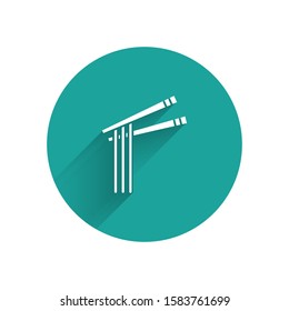 White Asian noodles and chopsticks icon isolated with long shadow. Street fast food menu. Korean, Japanese, Chinese food. Green circle button. Vector Illustration