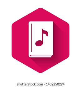 White Audio book icon isolated with long shadow. Musical note with book. Audio guide sign. Online learning concept. Pink hexagon button. Vector Illustration