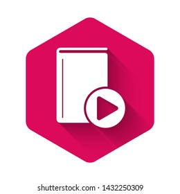 White Audio book icon isolated with long shadow. Play button and book. Audio guide sign. Online learning concept. Pink hexagon button. Vector Illustration