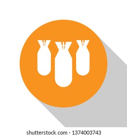 White Aviation bombs icon isolated on white background. Rocket bomb flies down. Orange circle button. Flat design. Vector Illustration