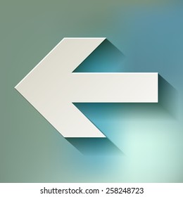 White back paper arrow symbol on bokeh background 