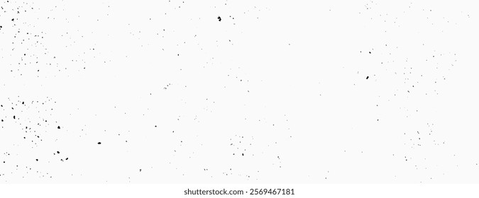 White background with black speckles, creating a minimalist, textured background. The white color enhances the simple, speckled design. Speckled wall texture background. White background vector.