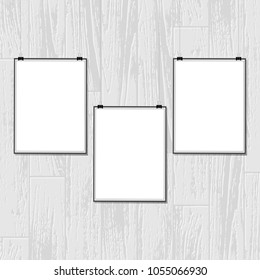 White background with gray wooden texture and three white placards for sample pictures