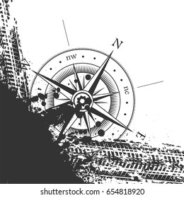 White background with ink blots, tire tracks and wind rose