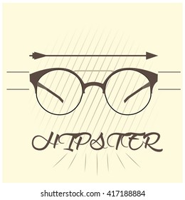 White background with text, an arrow and glasses