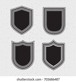 white background with zigzag lines and brown silhouette set collection emblems and shields vector illustration
