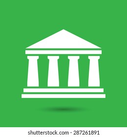 white bank icon on a green background
