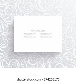 White banner on the wall with floral  pattern.