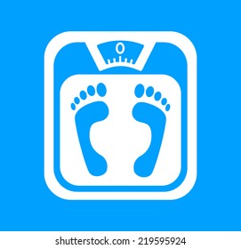 White bathroom scale on blue background 