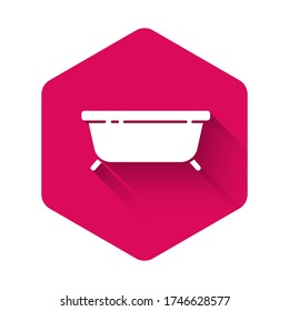 White Bathtub icon isolated with long shadow. Pink hexagon button. Vector Illustration