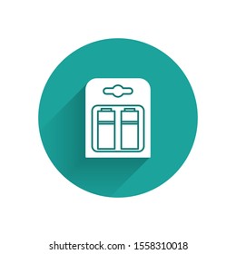 White Battery in pack icon isolated with long shadow. Lightning bolt symbol. Green circle button. Vector Illustration