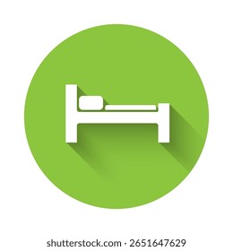 White Bed icon isolated with long shadow. Green circle button. Vector Illustration