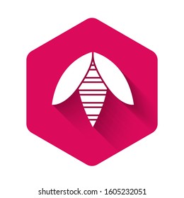 White Bee icon isolated with long shadow. Sweet natural food. Honeybee or apis with wings symbol. Flying insect. Pink hexagon button. Vector Illustration