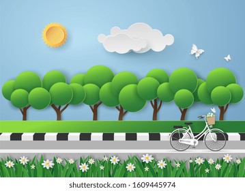 White bicycle on road in the garden with the fresh air in landscape view. Vector illustration art design in paper cut style and green nature concept.