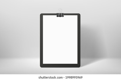 White binder with white paper sheet and pin