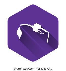 White Bio fuel concept with fueling nozzle and leaf icon isolated with long shadow. Natural energy concept. Gas station gun sign. Purple hexagon button. Vector Illustration