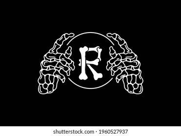 White black color of skeleton R initial letter with hand design