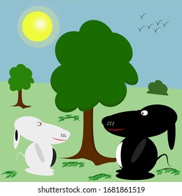 White and black dog on the background of nature