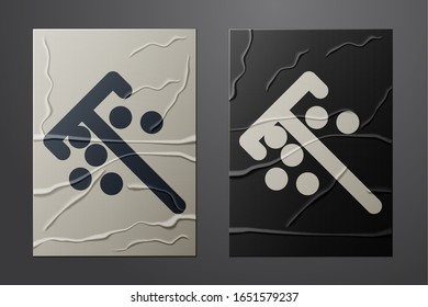 White and black Stick for chips icon isolated on crumpled paper background. Casino gambling. Paper art style. Vector Illustration