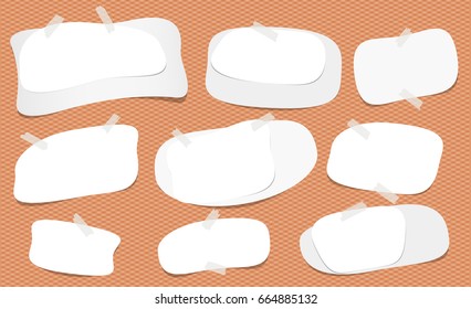 White blank note, notebook, copybook sheet with rounded corners stuck with sticky tape on squared orange background.