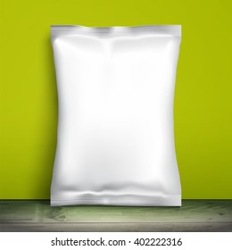 White blank package for food template is on the background of green walls. Sample Plastic bag for snacks, Mockup 