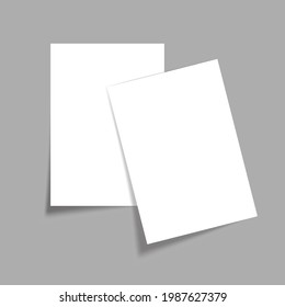 White blank paper sheet with shadow isolated on grey background.
