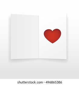 White blank postcard has red heart cut in with shadow.