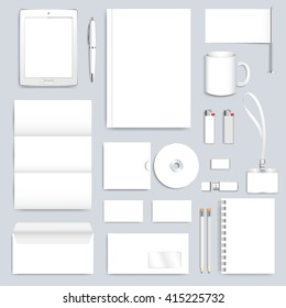 White blank set of vector corporate identity template. Modern business design  presentation brochure, leaflet, envelope, card, badge, cup, tablet pc, pen, pencil. Stationery clean mock-up.