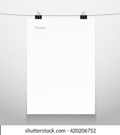 White blank sheet on black clips. 