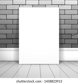 A white blank sheet of paper or poster stands near the brick wall on the boards. Mockup for design with shadow