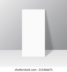 White blank stationary near the wall with shadow. 