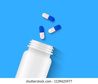White and blue capsules with white pill bottle on blue background