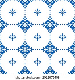 White and blue ceramic tile seamless pattern. Simple geometric floral ornament. Vector illustration.