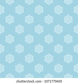 White and blue floral pattern. Seamless ornament for textile and wallpapers