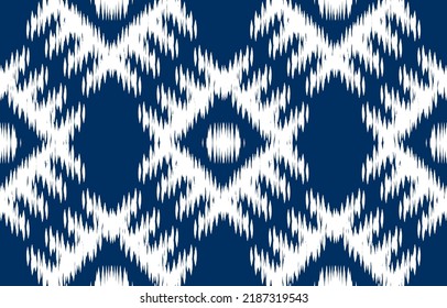 white and blue ikat ethnic design
 background. Seamless ikat floral pattern in tribal, folk embroidery abstract art. art ornament print.Design for carpet, wallpaper, clothing, wrapping, fabric fashion