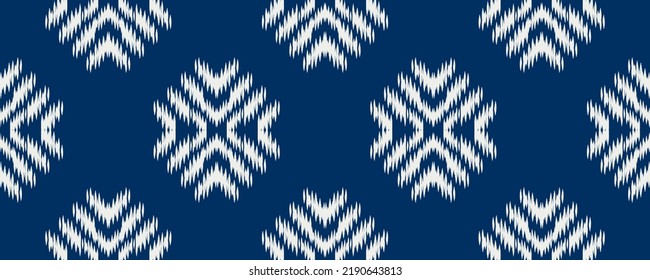 white and blue ikat ethnic design
 background. Seamless ikat floral pattern in tribal, folk embroidery abstract art. art ornament print.Design for carpet, wallpaper, clothing, wrapping, fabric fashion