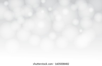 White blur abstract background with bokeh. Winter backgrounds with snow flake.  