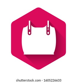 White Body armor icon isolated with long shadow. Pink hexagon button. Vector Illustration